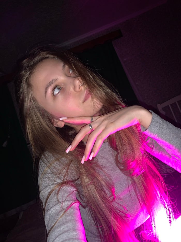 Young woman documented in casual indoor portraits in Фоки, Russia