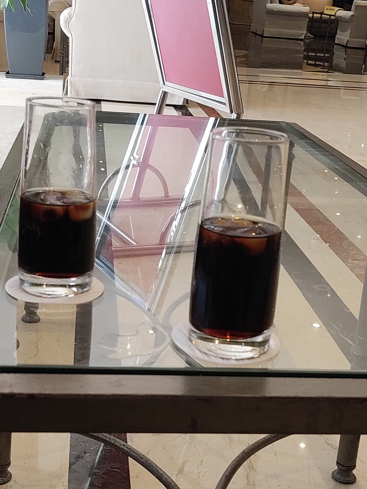 Inside a well-appointed hotel lobby in Rhodes, Greece
