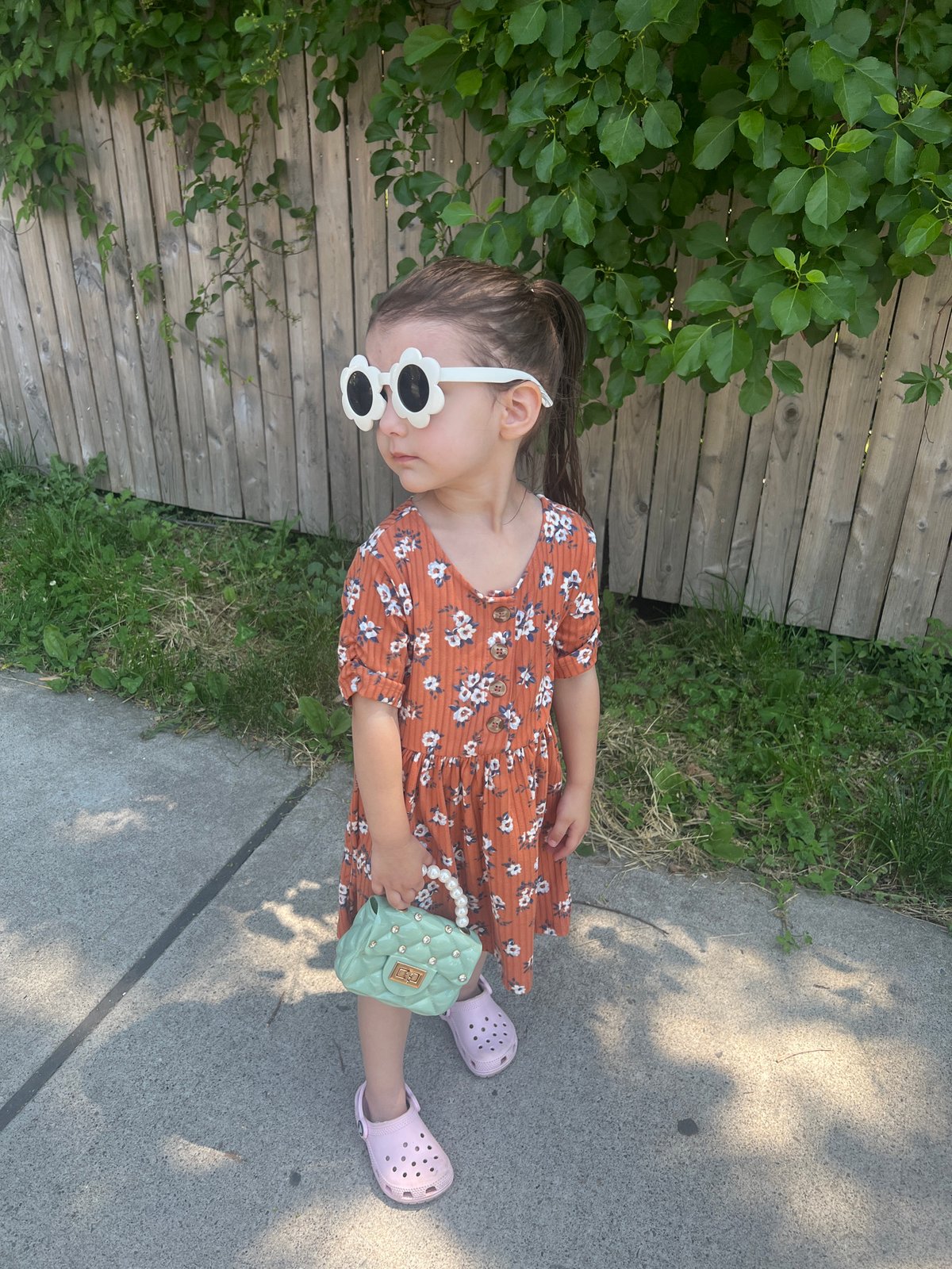 Young girl in floral dress spotted on Newburgh walkway
