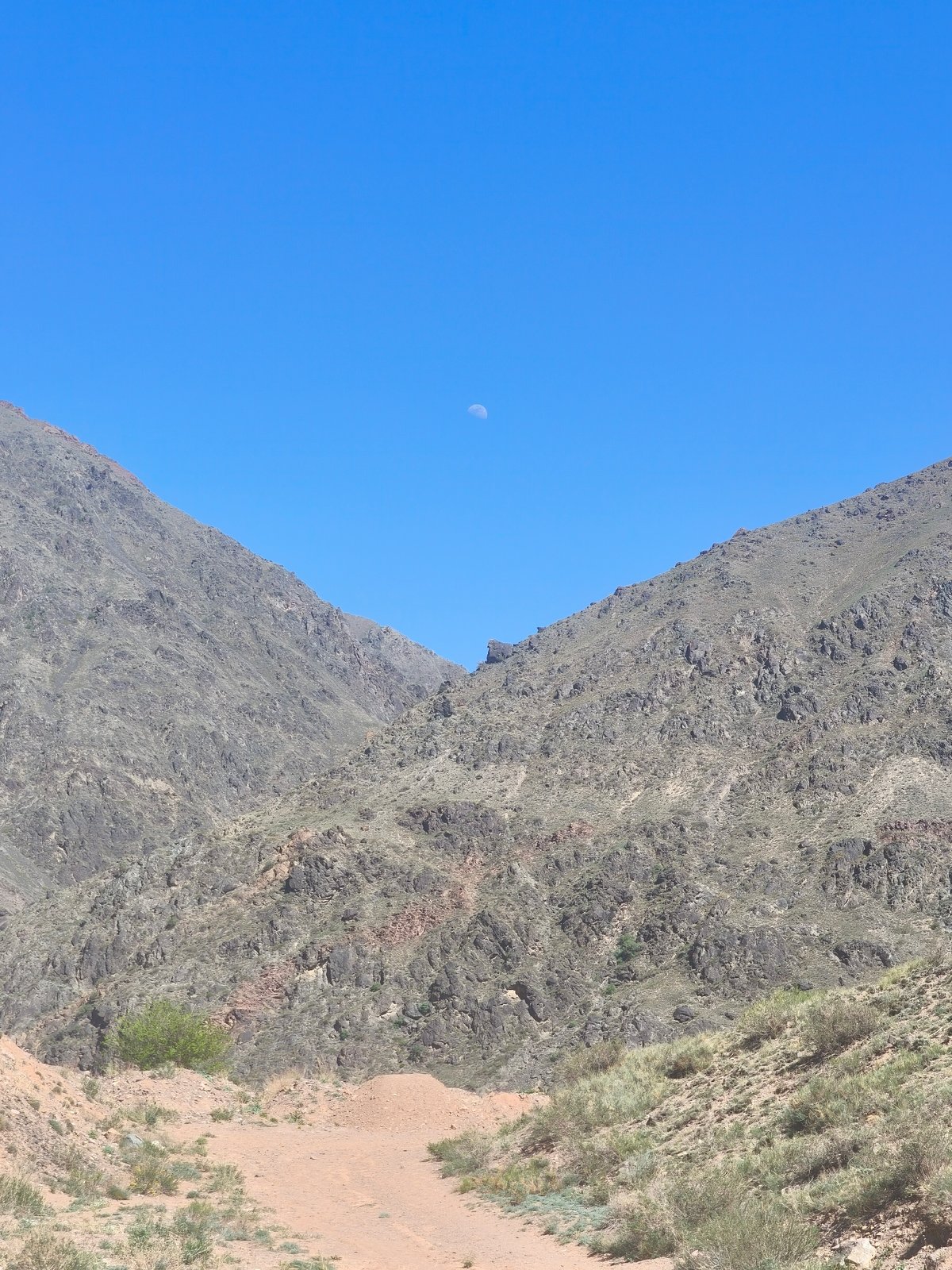 Morning hike documented in Kyrgyzstan mountain valley near Krasnyy Most