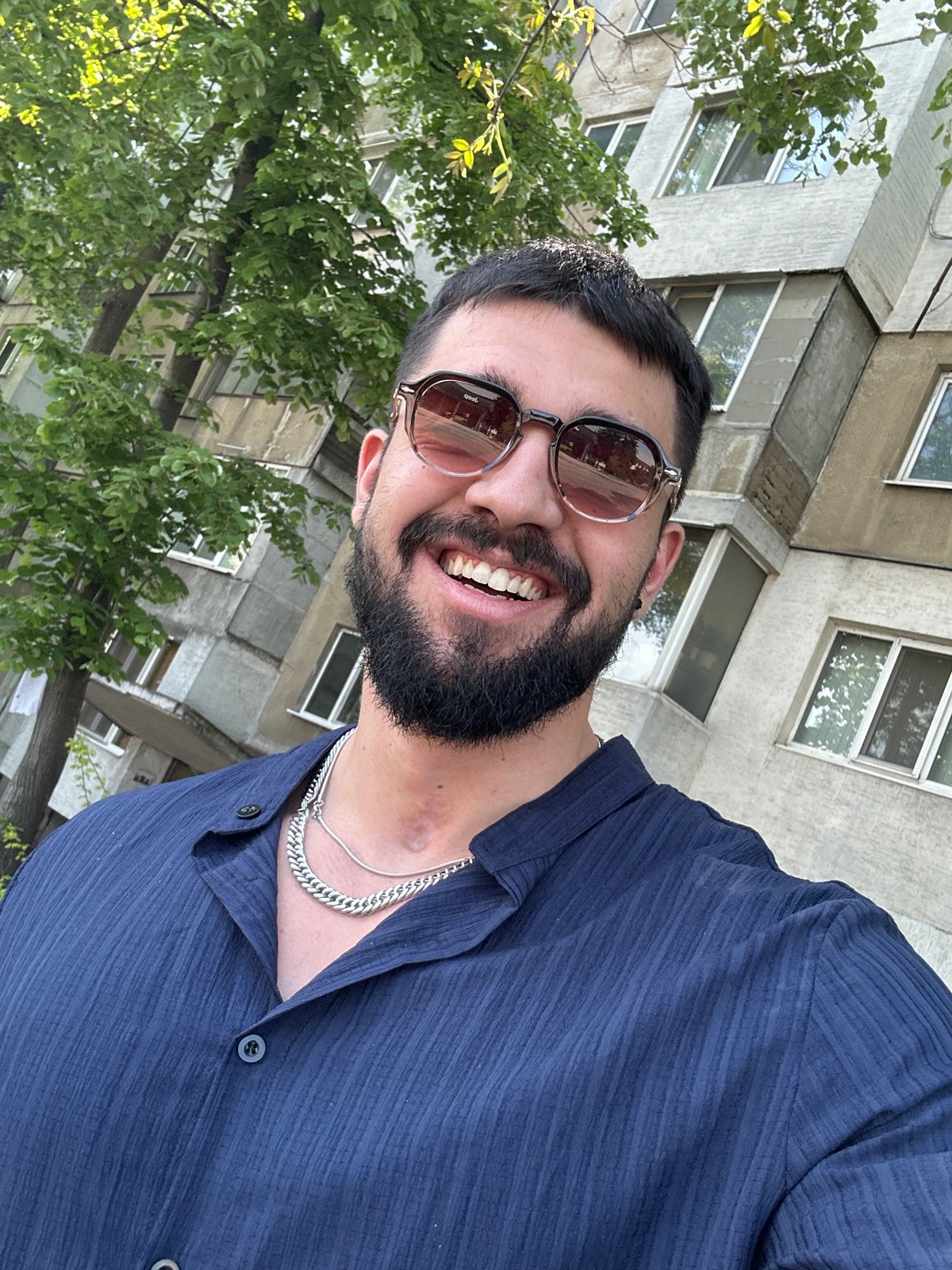Man takes selfies outdoors in Sofia, Bulgaria