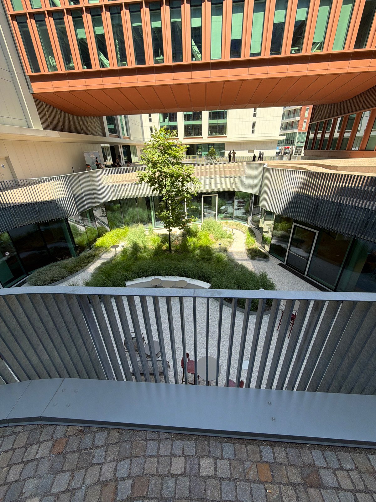 Milan campus afternoon: architecture, a café, and a Lego Minas Tirith