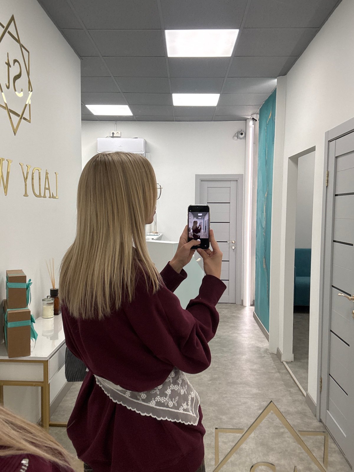 Woman documents salon visit and manicure in Krasnoyarsk