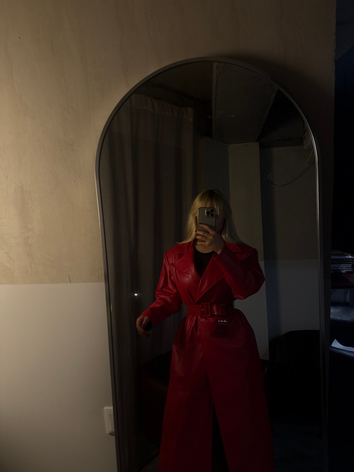Mirror selfie captured in red jumpsuit in Yerevan