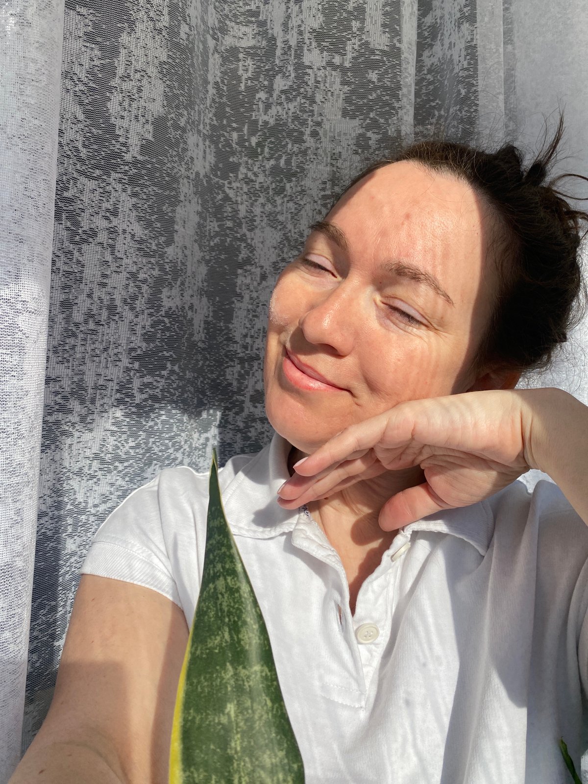 Woman resting on patterned surface observed in Ольховка, Russia