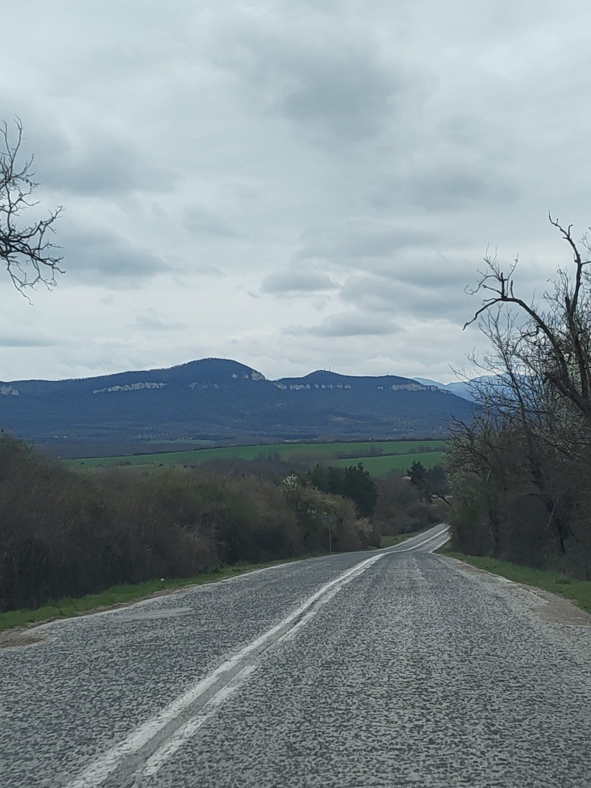 Rural road through mountainous landscape captured in Bulgaria