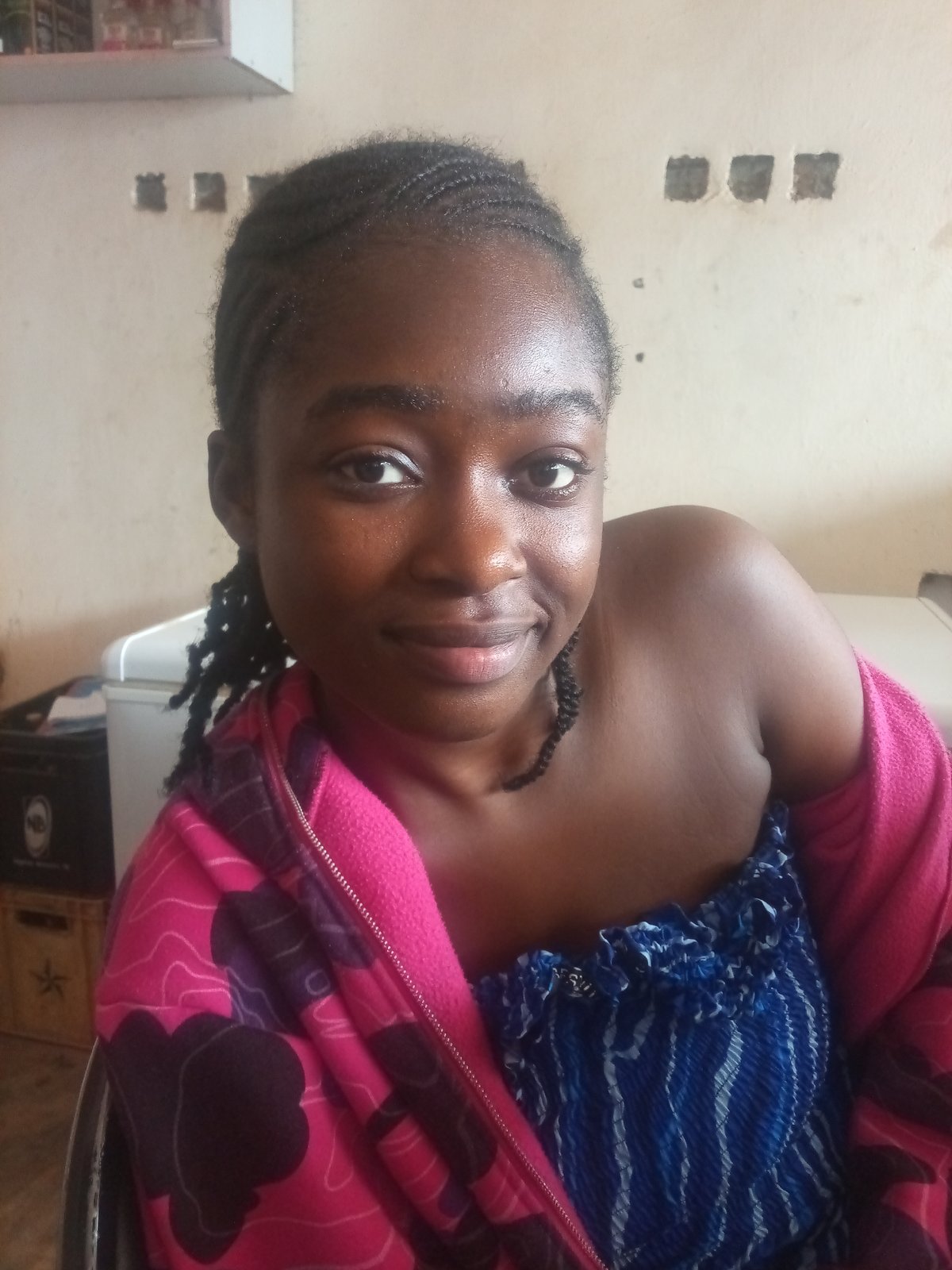 Woman documents jollof rice meal in selfie sequence