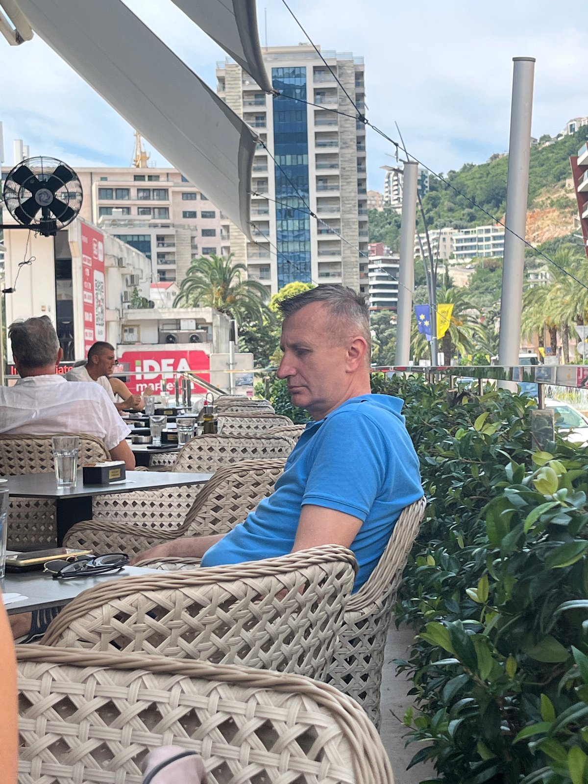 Summer morning at an outdoor café in Budva, Montenegro.