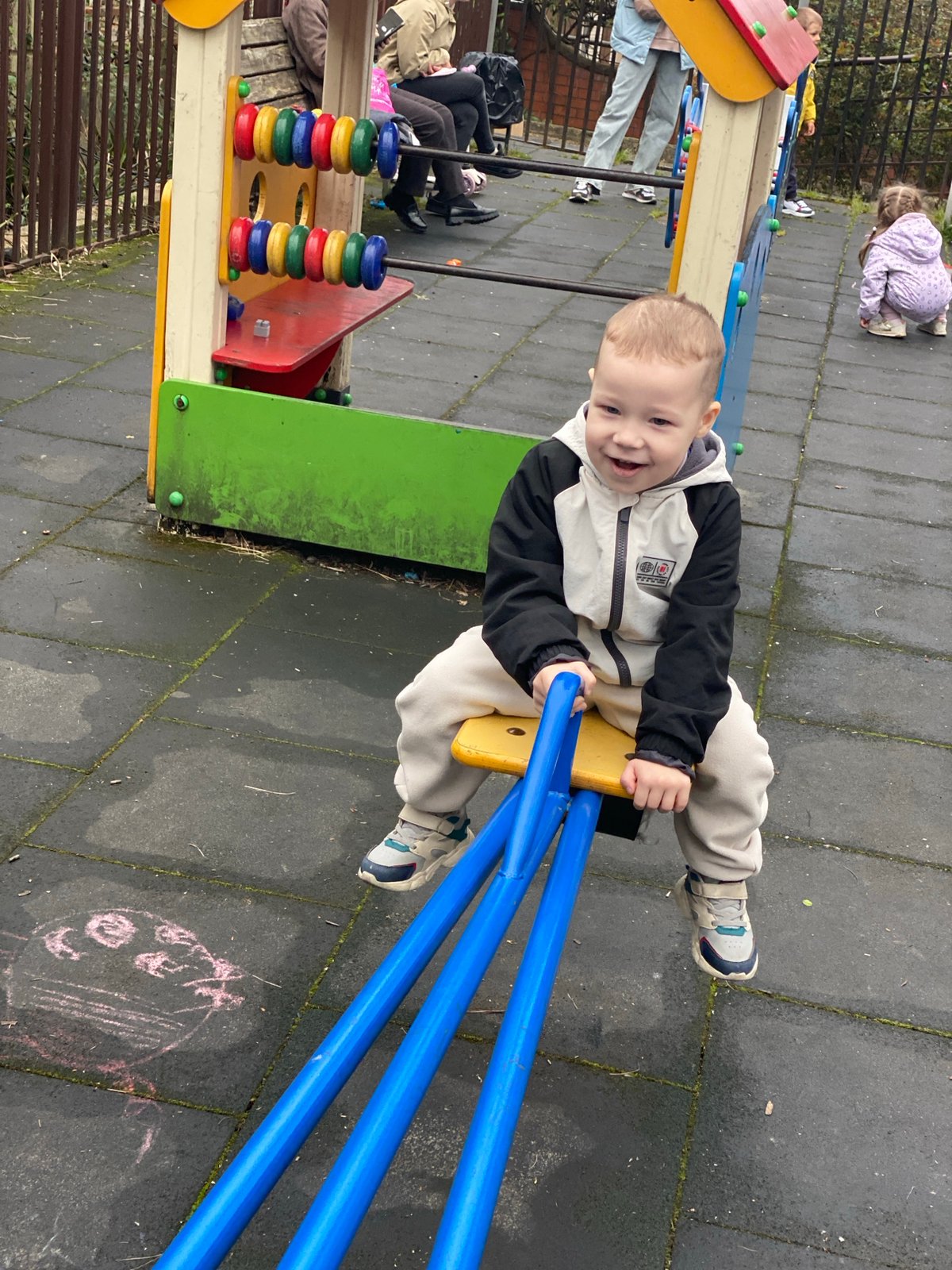 Child plays on seesaw at Sochi playground