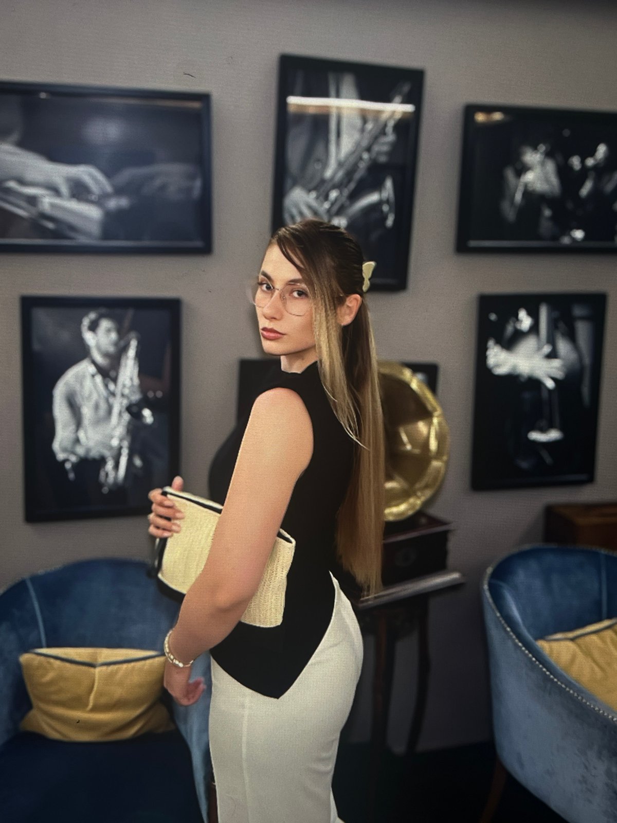 Woman attends medical lecture in jazz-themed room