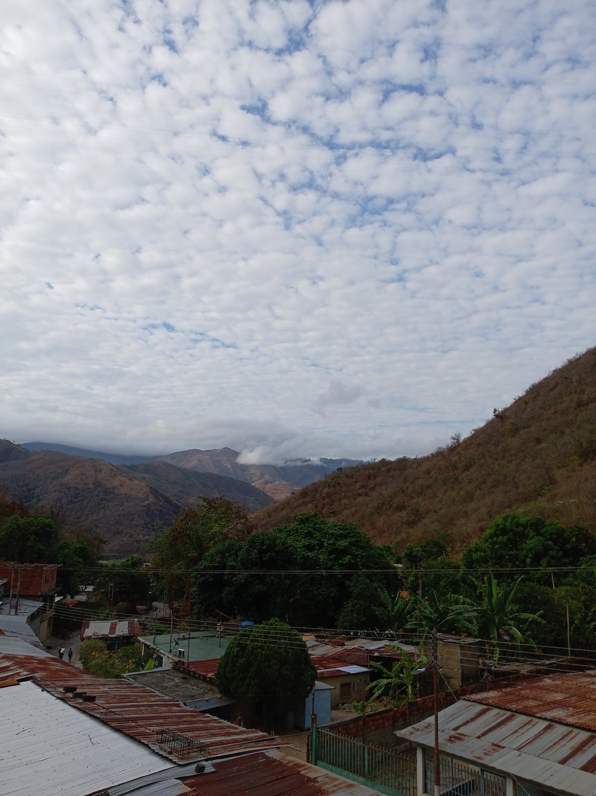Cloudy skies and disaster damage observed in Las Tejerías