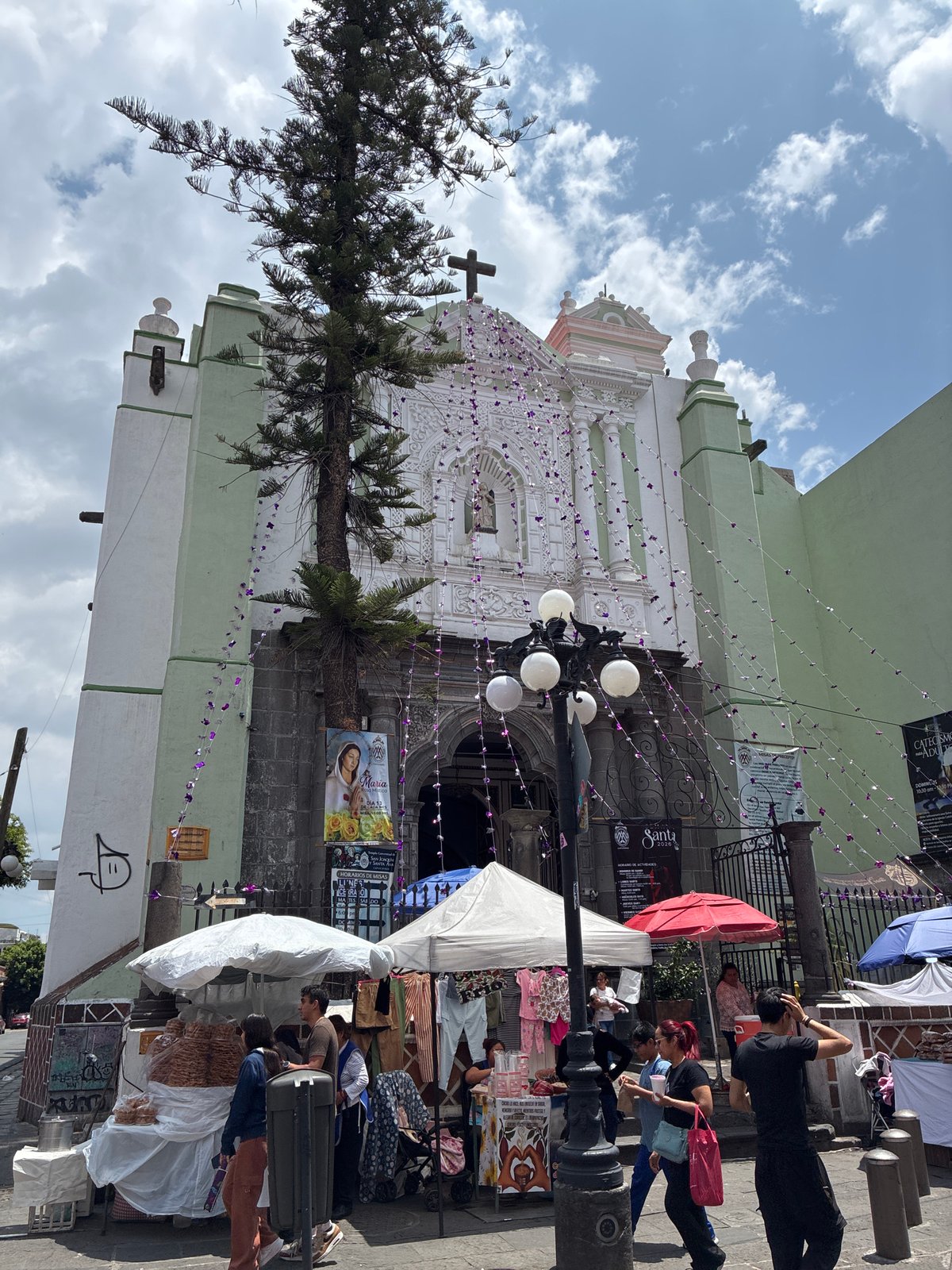 Visitor explores Puebla with tennis gear, drinks, sightseeing