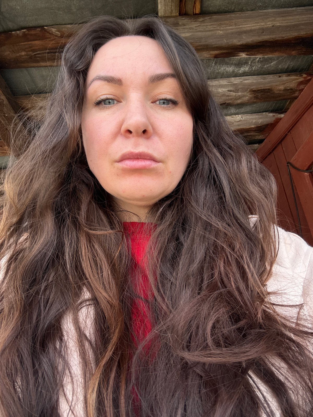 Spring morning documentation in Chaikovsky shows melting snow, personal belongings