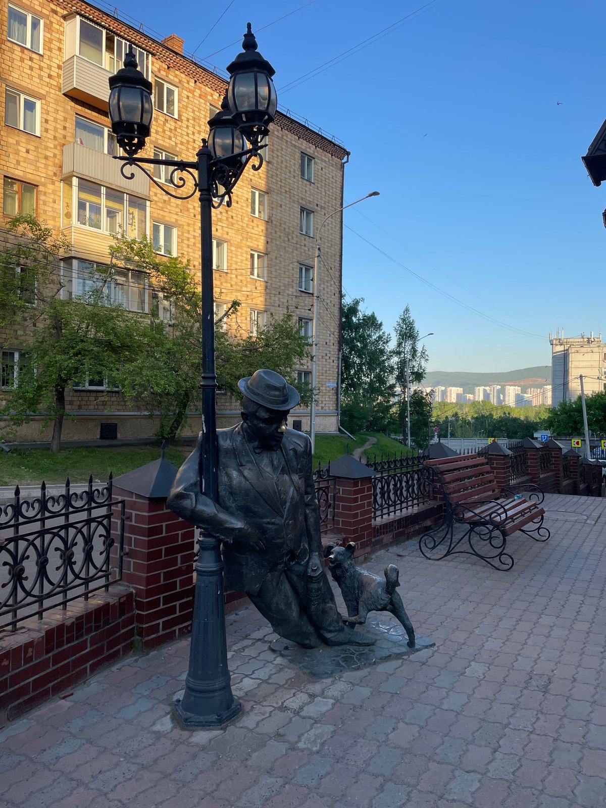 Bronze statue and ornate clock documented in Krasnoyarsk