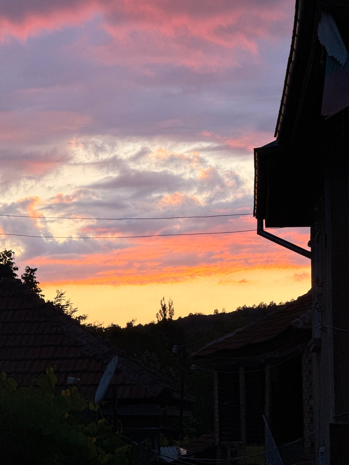 Vivid sunset colors over the village of Slavyani, Bulgaria