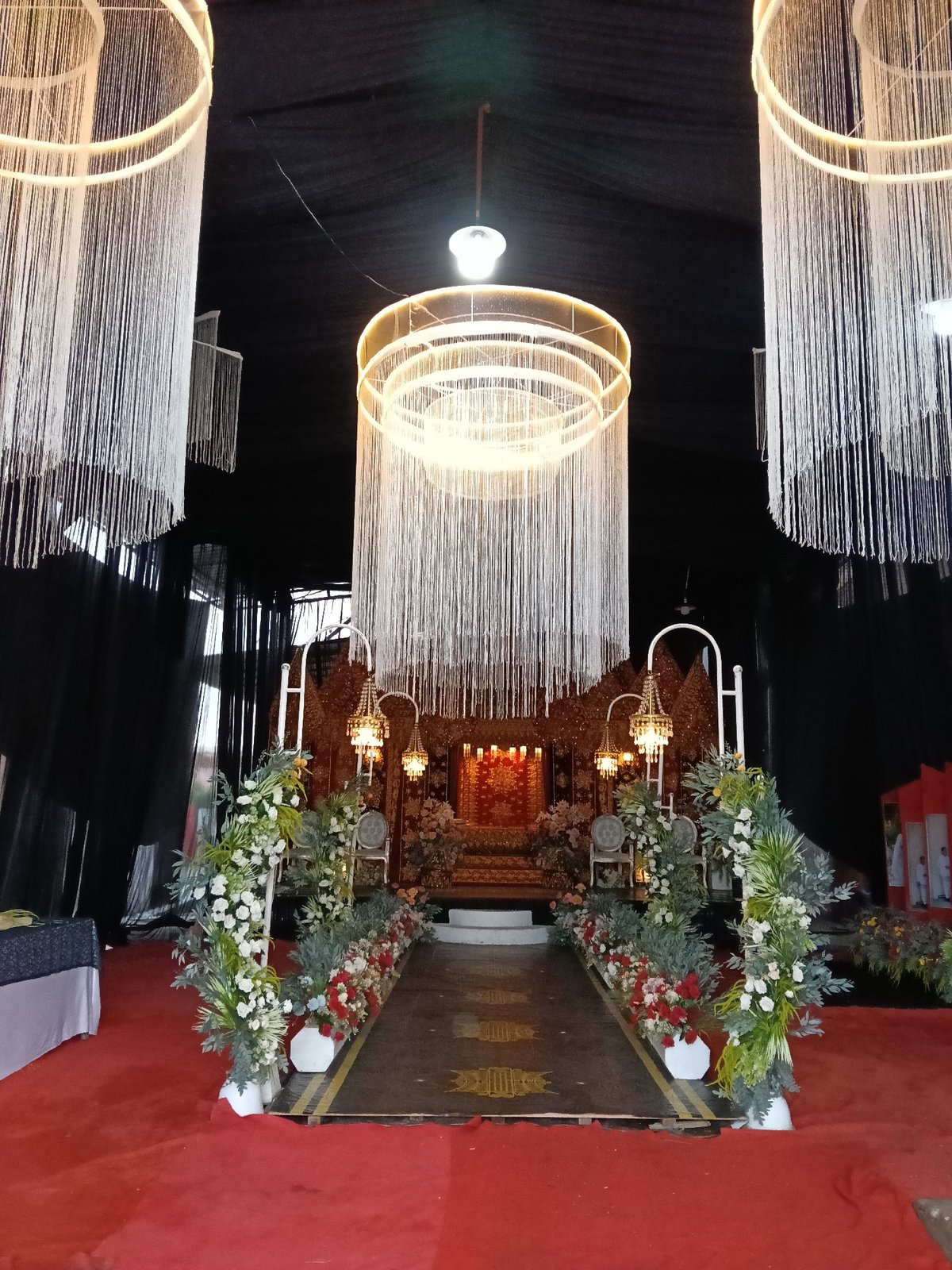Traditional wedding venue setup documented in Lhokseumawe, Indonesia