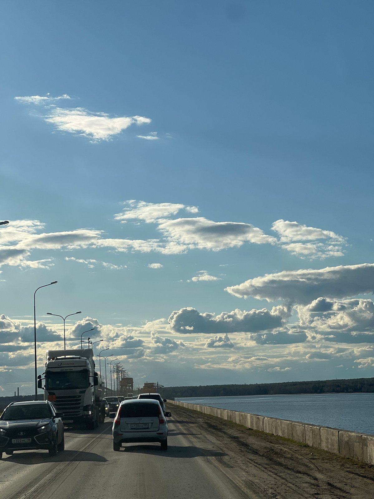 Midday scenes documented around Chaikovsky's waterfront and roads