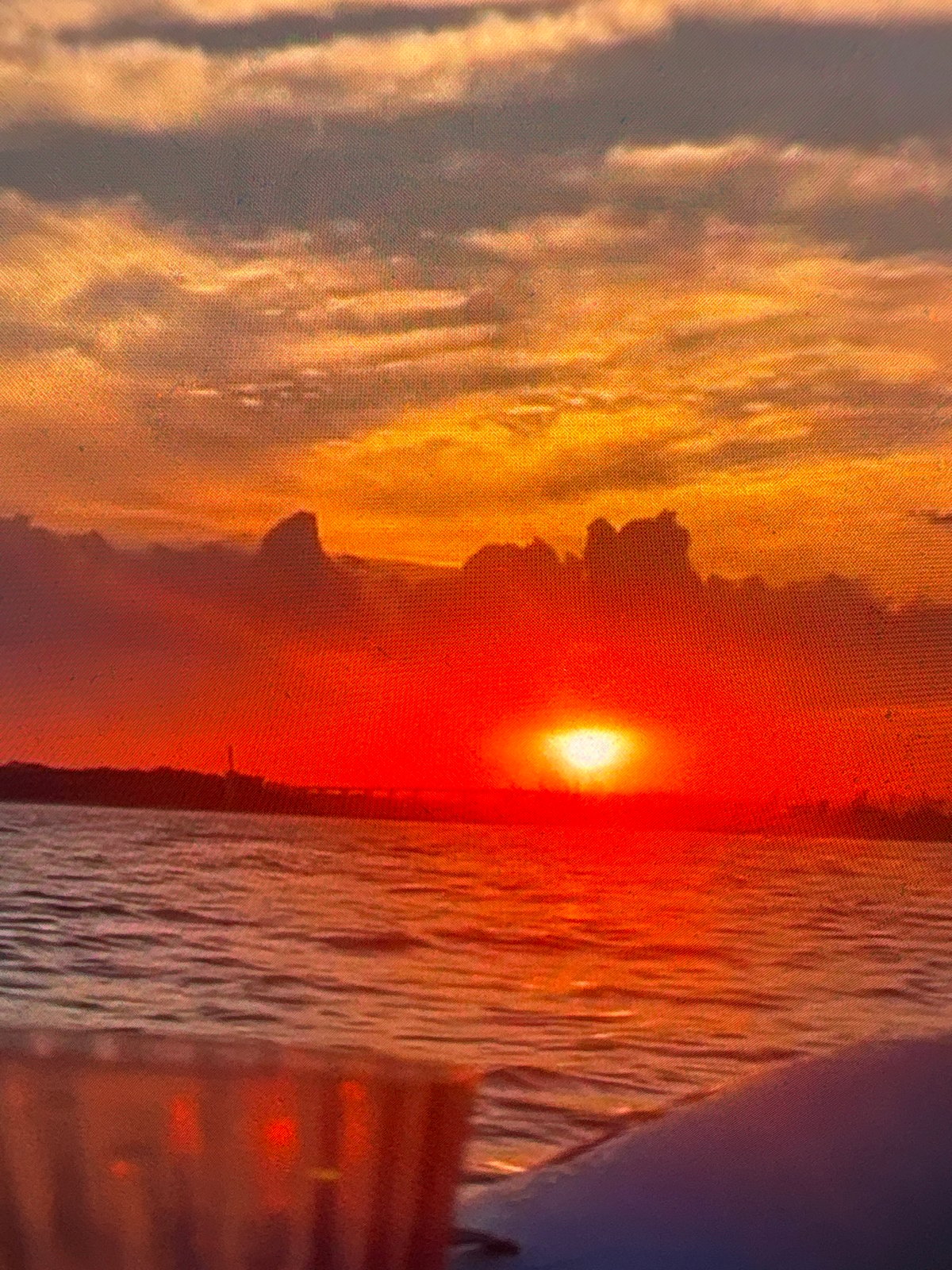 Sunset captured through emergency vehicle equipment at dawn hours