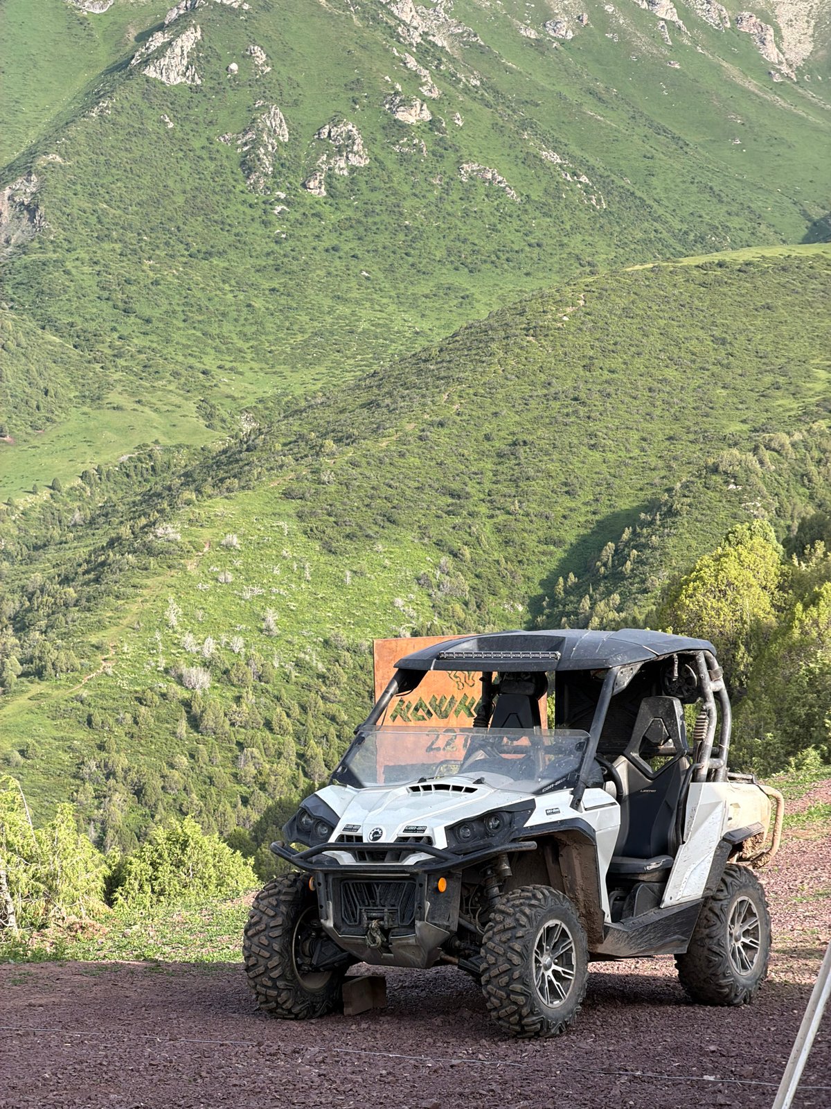 Alpine gathering in Kashka Suu: tents, ATVs, and mountain scenery
