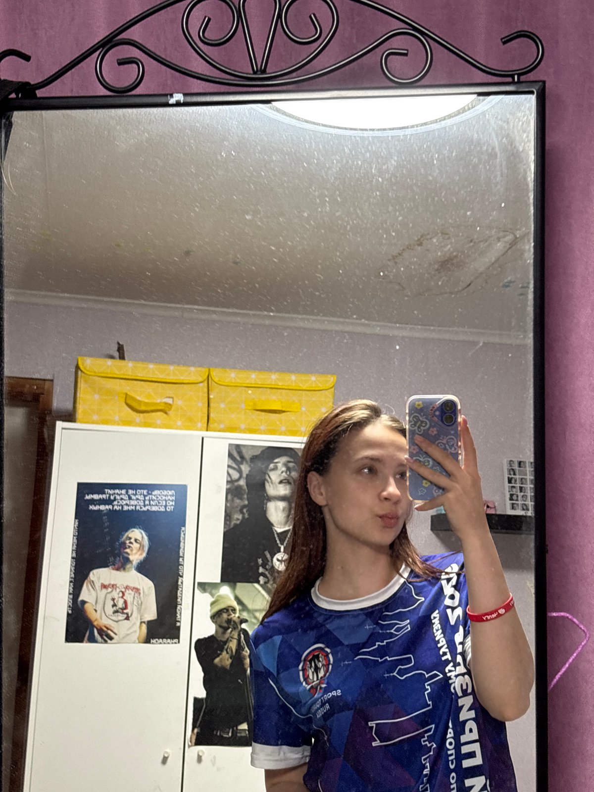 Woman takes mirror selfies in soccer jersey in Russia
