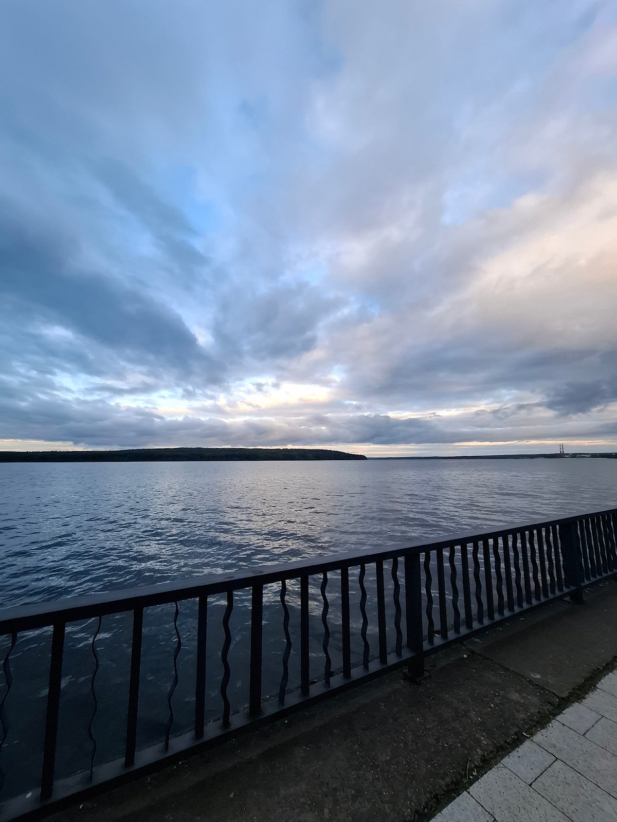 Evening family activities documented along Chaikovsky waterfront promenade