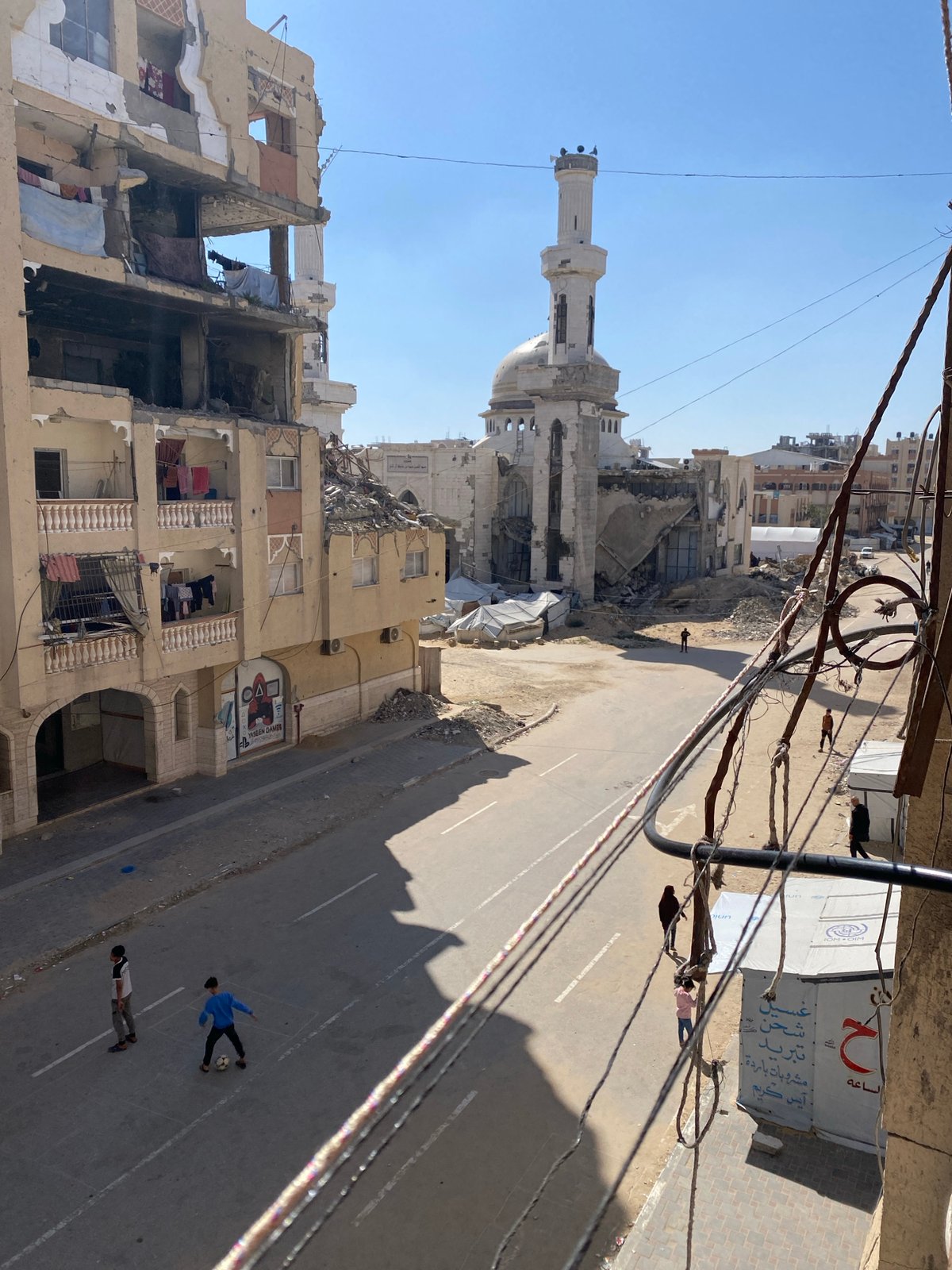 Daily life continues amid damaged buildings in Khan Yunis