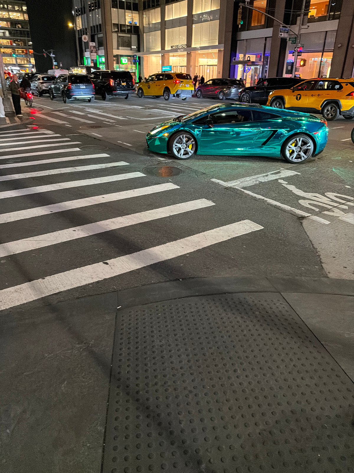 Turquoise Lamborghini spotted on Manhattan street at night