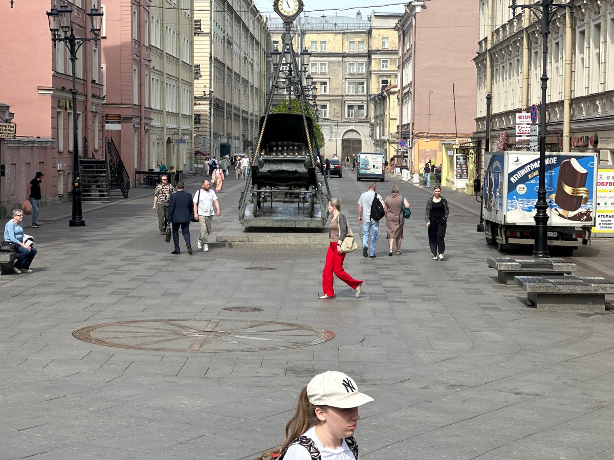 Morning pedestrian activity observed in Saint Petersburg street scene