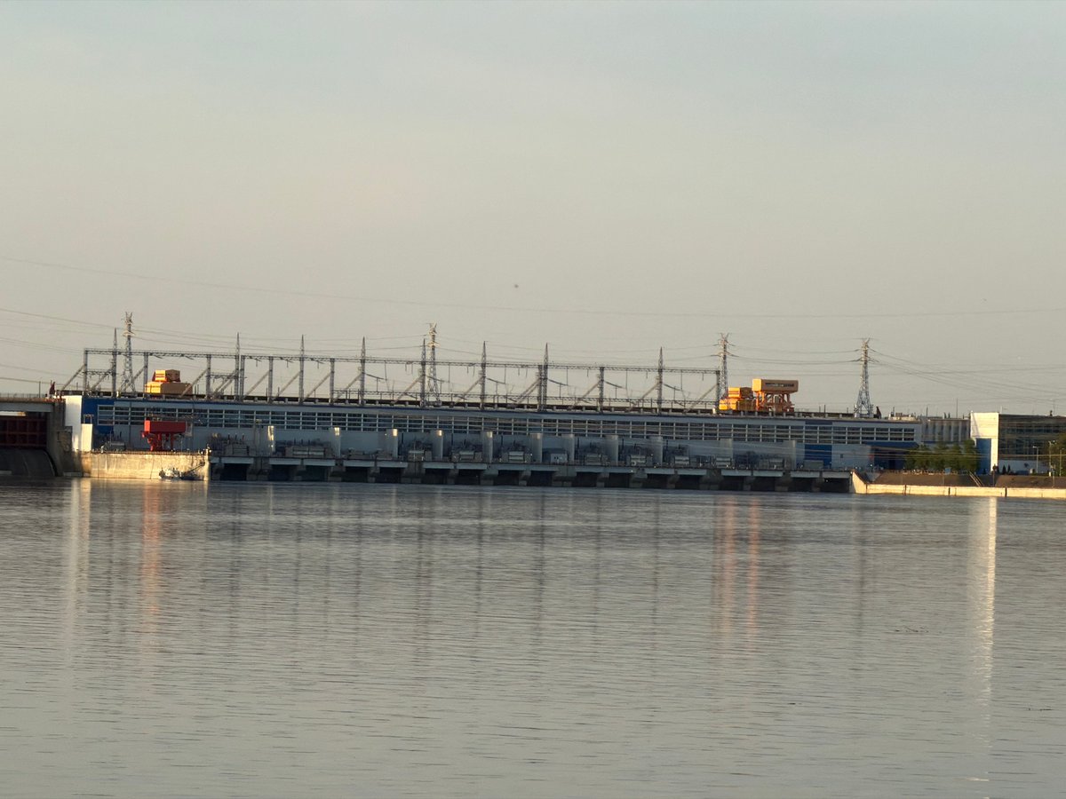 Hydroelectric facility and river activities documented in Noviy, Russia