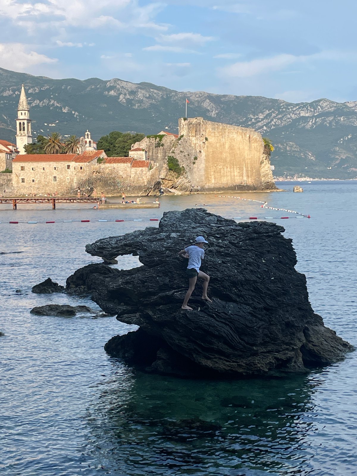 Tourists enjoy coastal activities around Budva Montenegro attractions