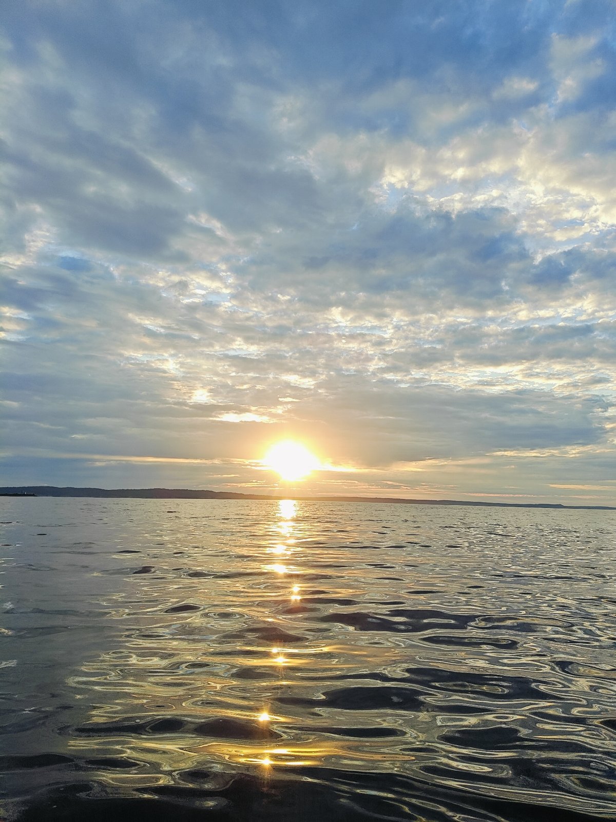 Evening fishing on the Kama River under a dramatic Chaykovsky sunset