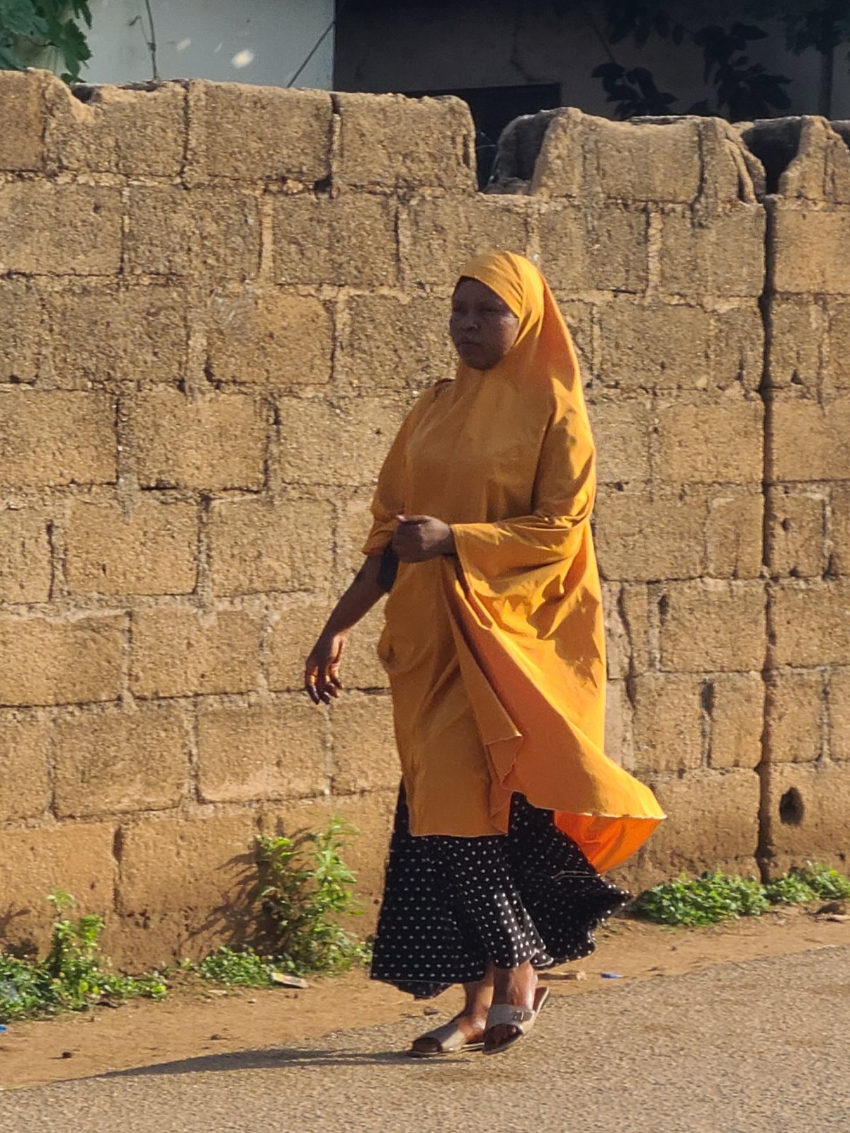 Morning street life documented across Jos, Nigeria neighborhoods