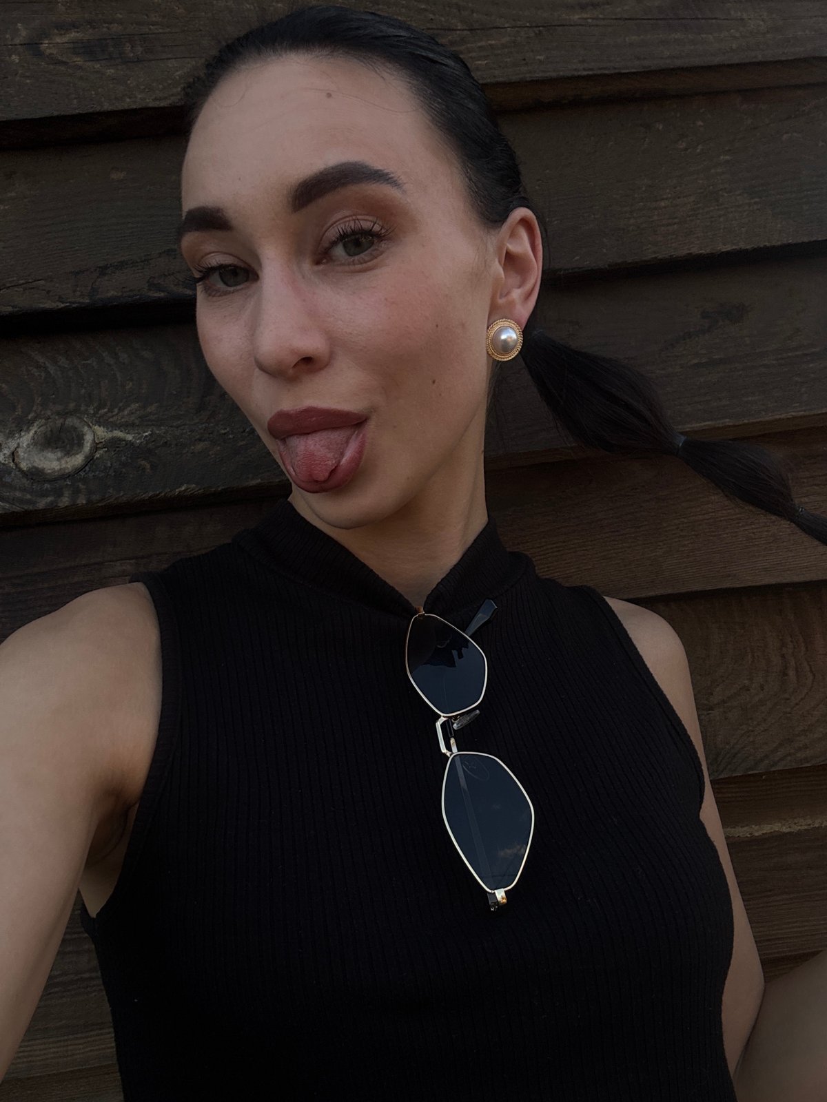 Woman photographed in casual afternoon scenes around Chaikovsky, Russia