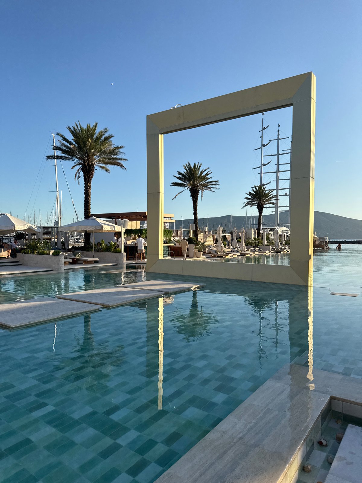 Luxury resort with pool and marina observed in Tivat