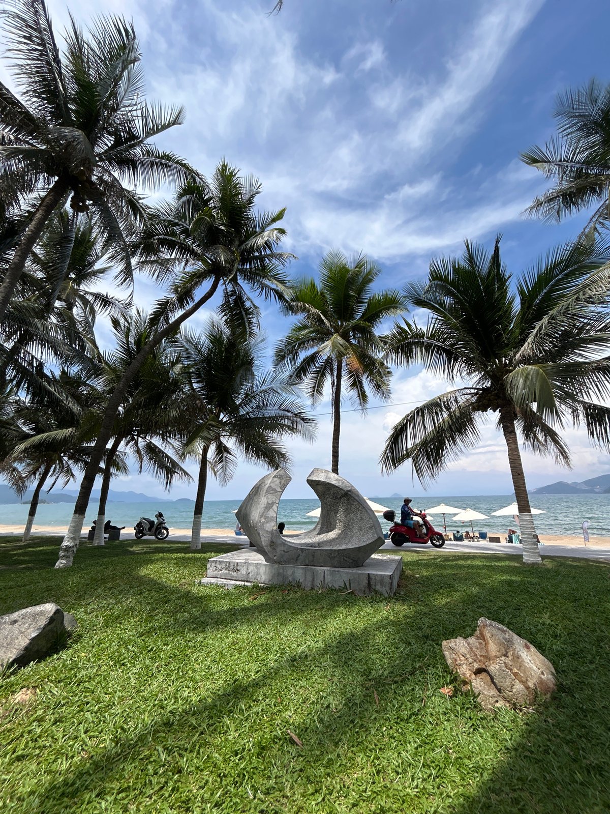 Early morning tourist moments captured around Nha Trang beach monuments