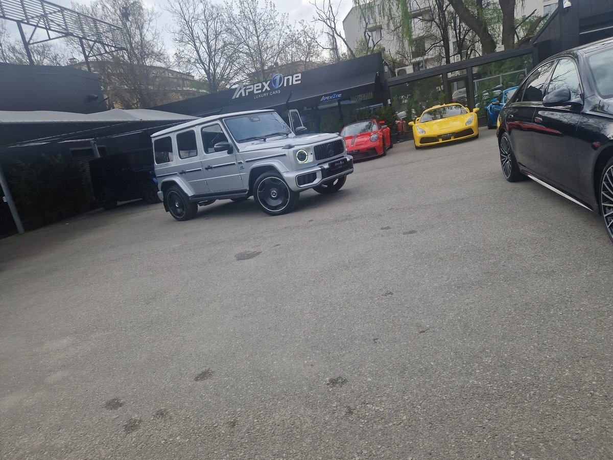 Overcast day captured at APEX One luxury car dealership