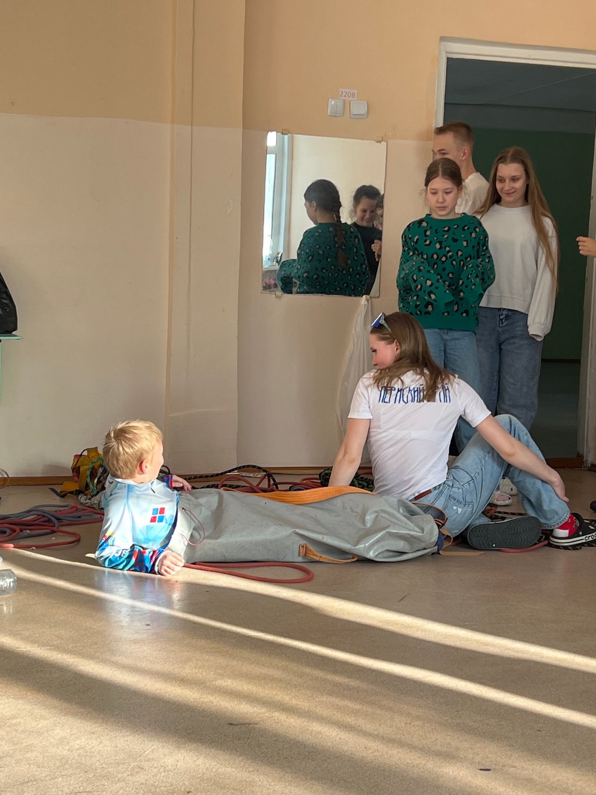 Youth climbing session documented at Berezniki gymnasium facility