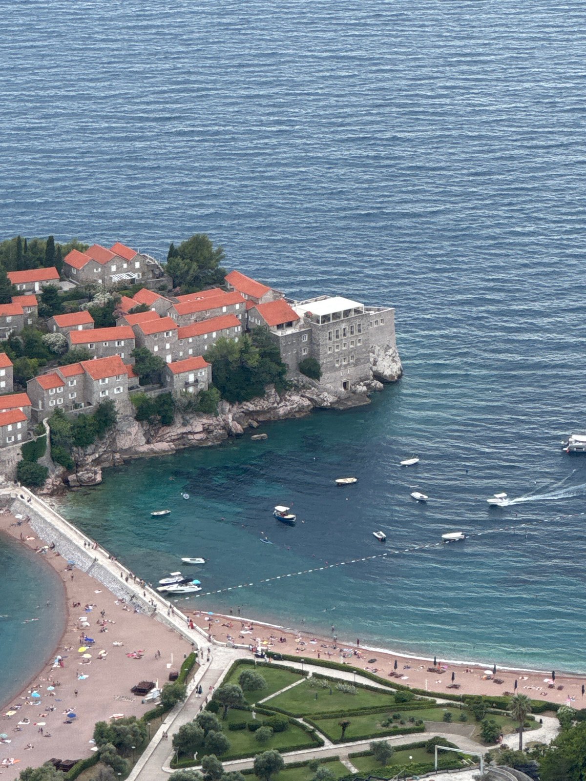 Sveti Stefan island and coastline, seen from above and ground