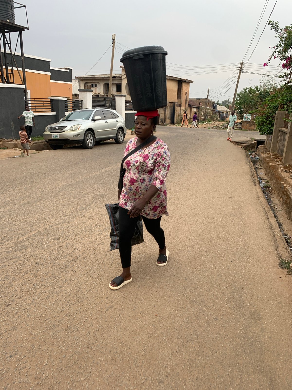 Daily life unfolds on Jos streets during afternoon hours