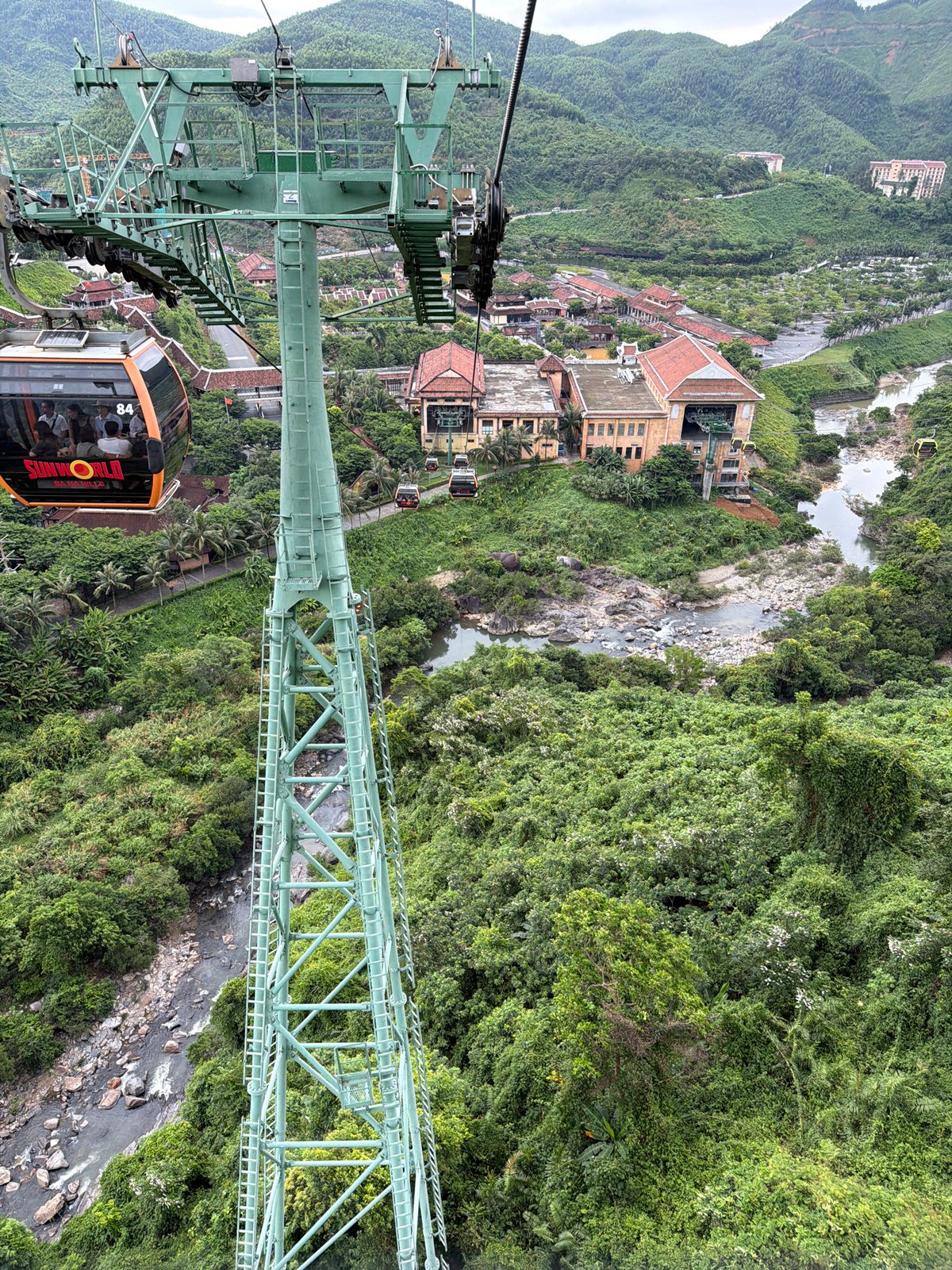 Tourist rides cable car through Ba Na Hills, Vietnam
