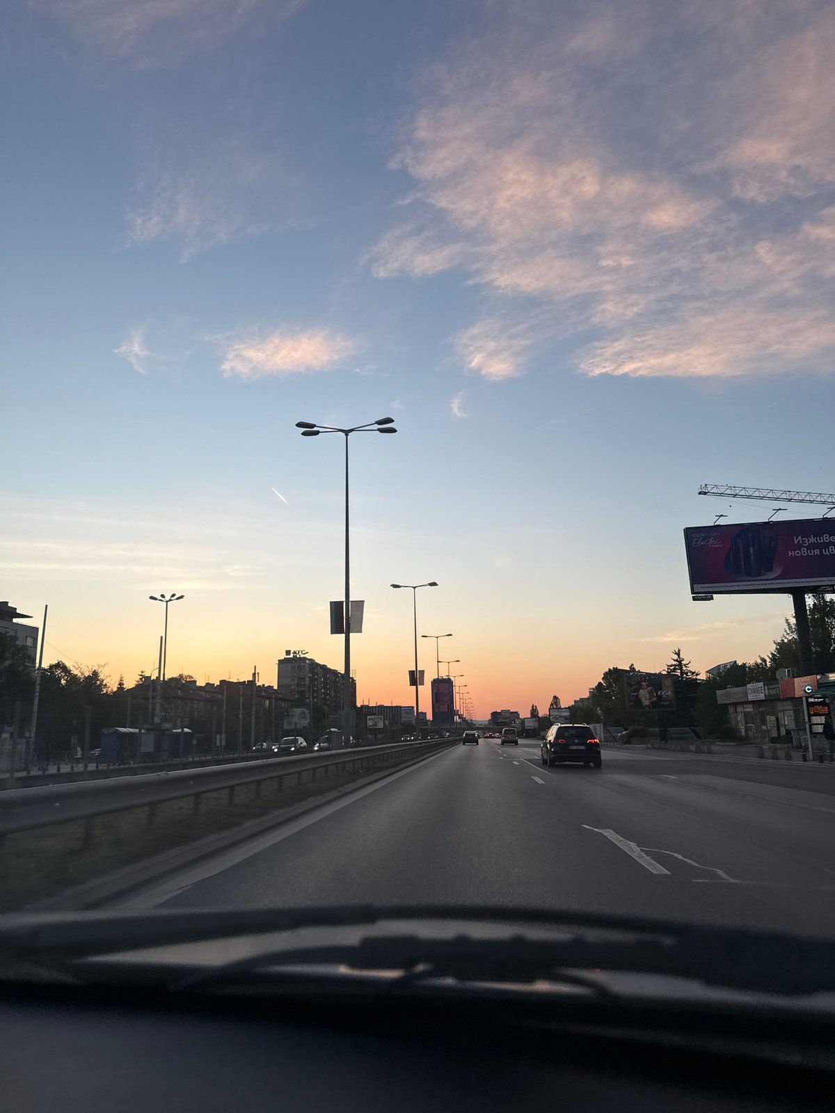 Evening traffic captured from vehicle on Sofia road