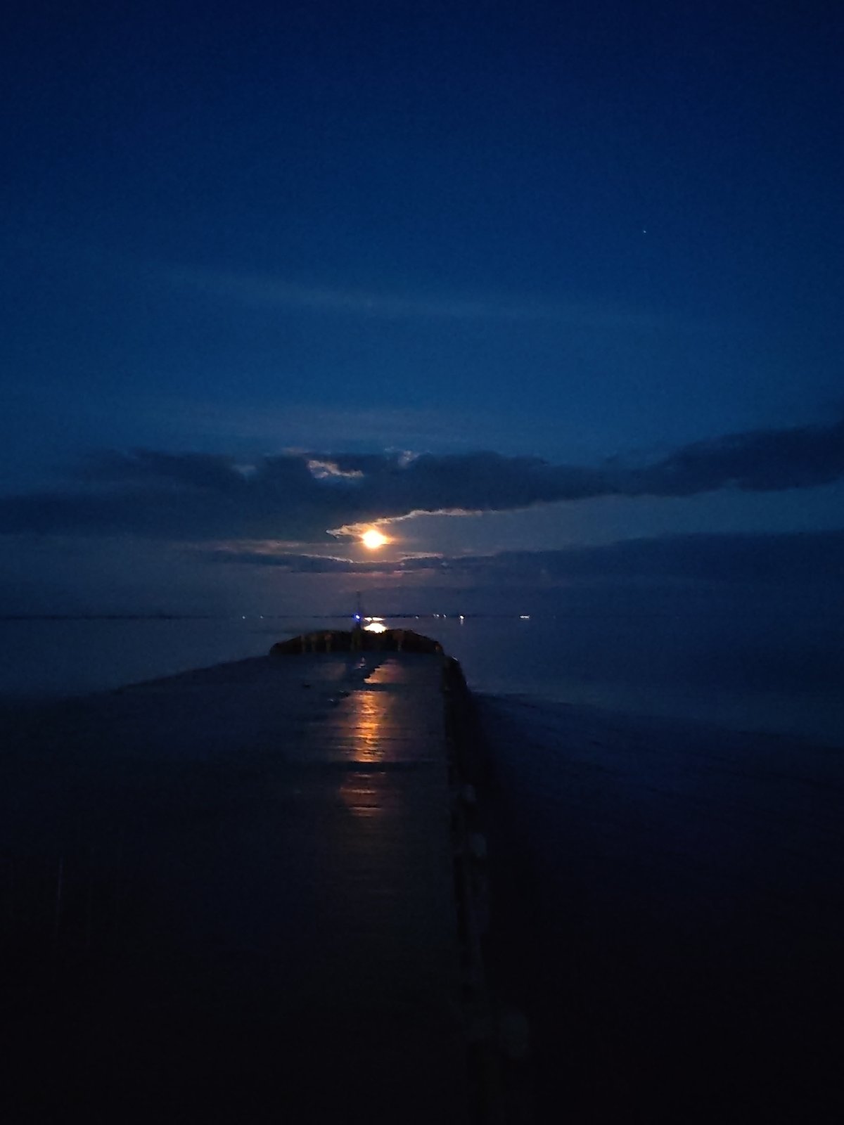 Full moon illuminates waterscape in Bol'shie Mkhi, Russia