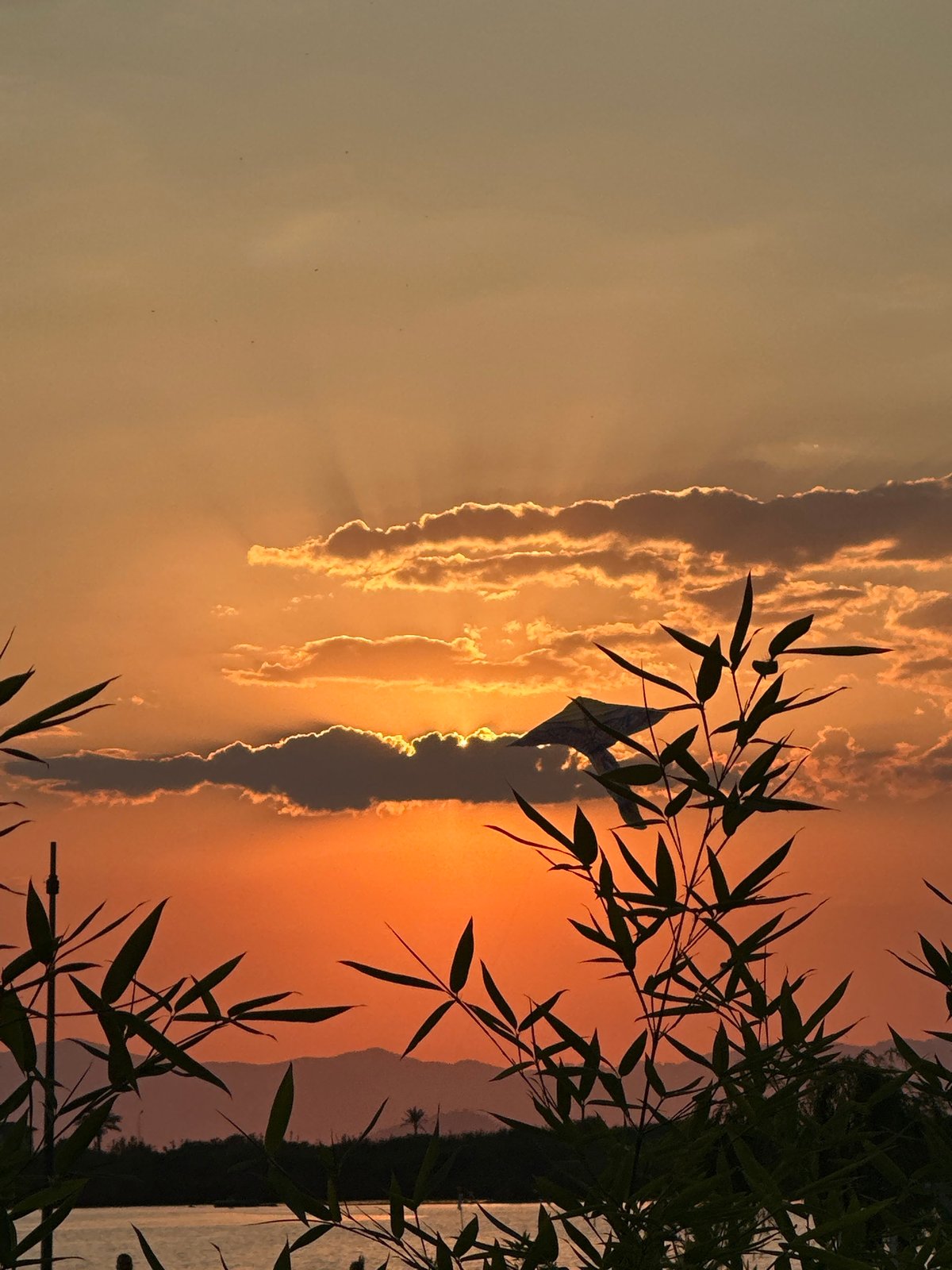 Calm Mediterranean sunset with a kite over Fethiye