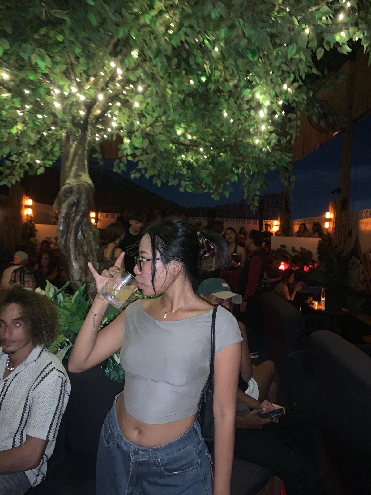 Evening social gathering at outdoor North Kuta bar venue