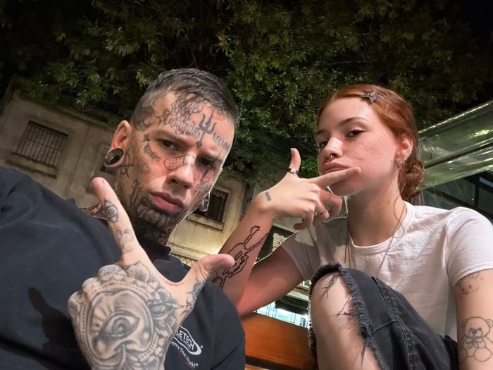 Two people photographed together outside Buenos Aires restaurant