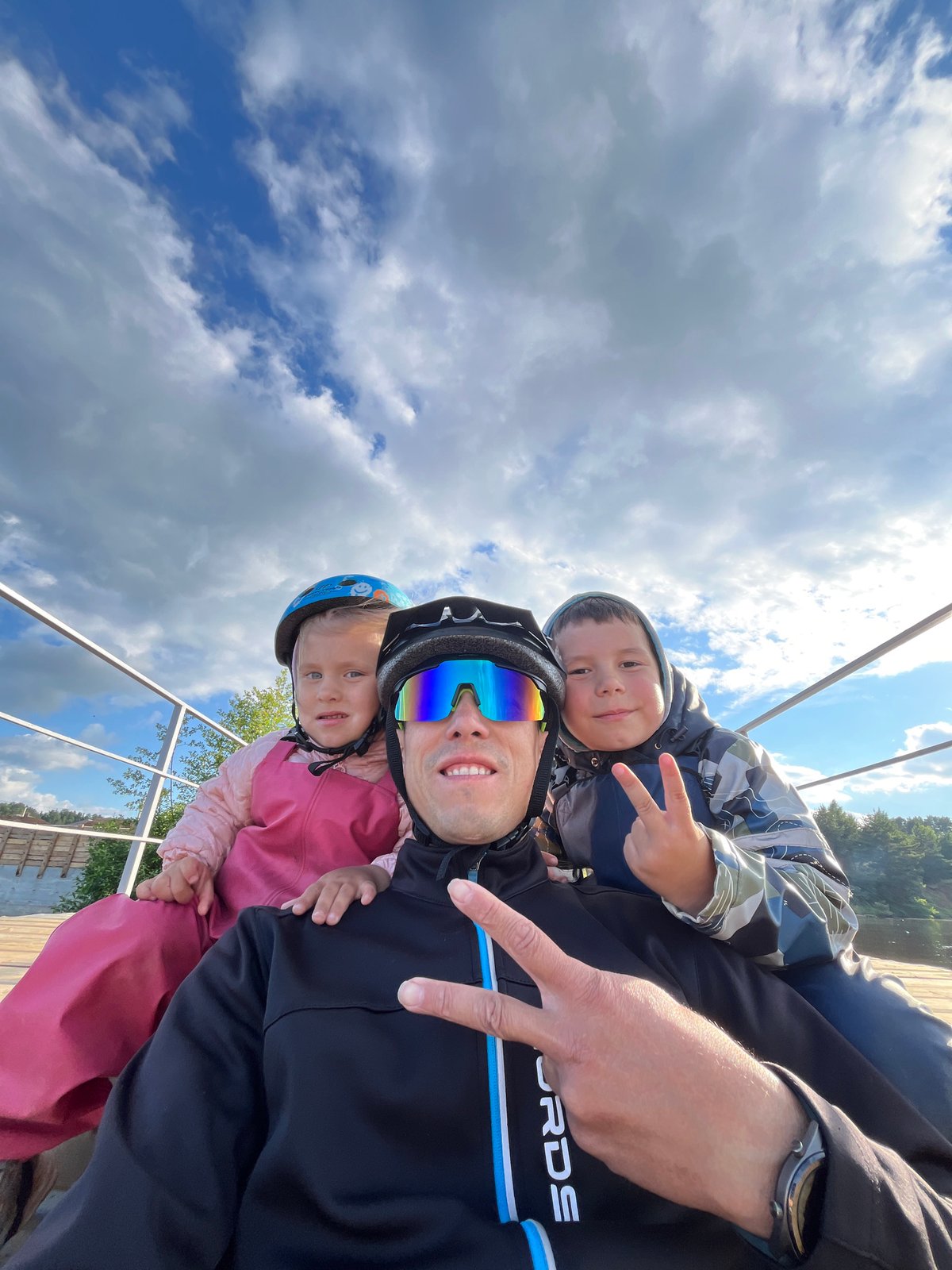 Sunny pier stop on a Chaikovsky lakeside bike ride