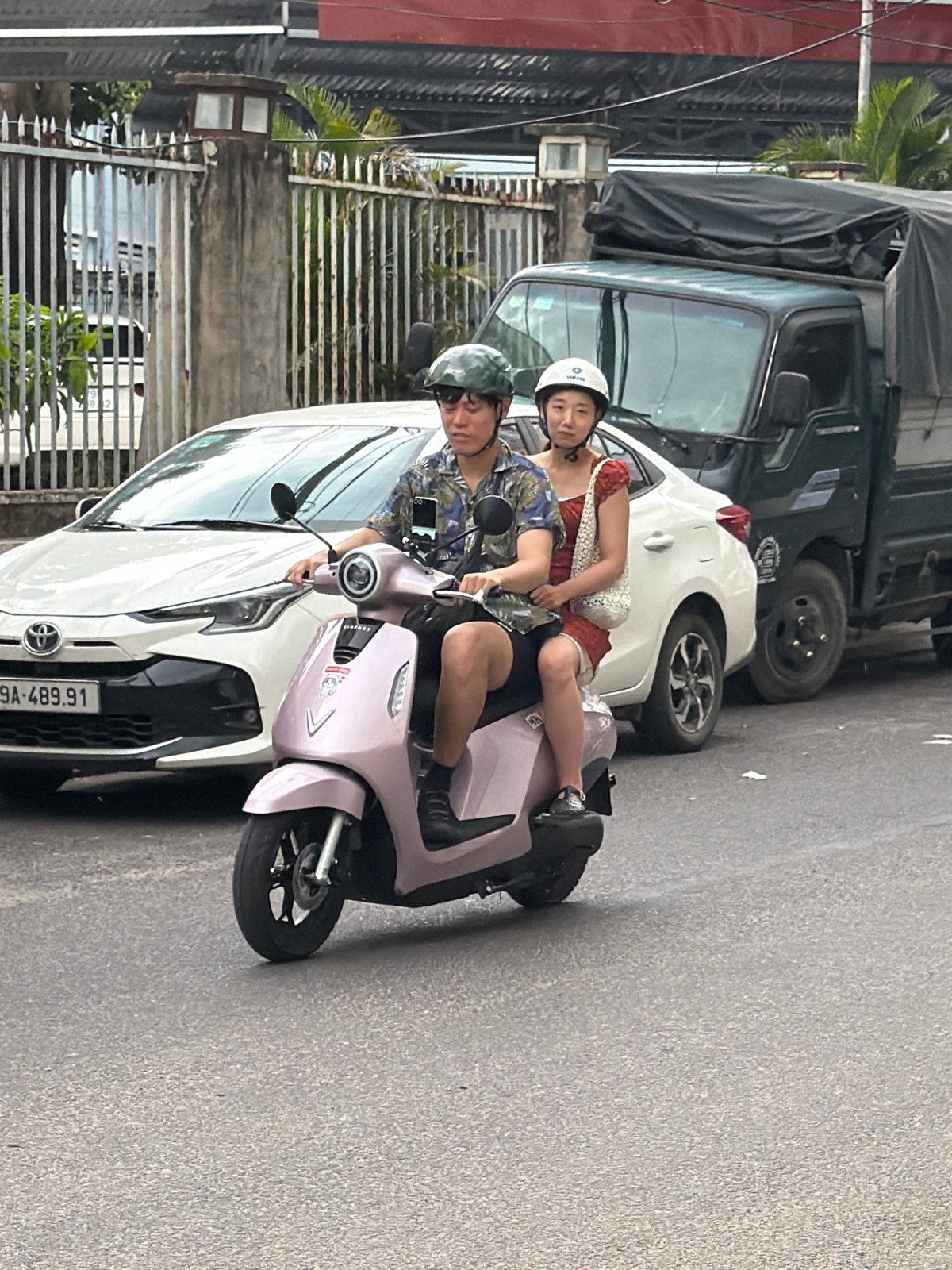 Scooter traffic on a Nha Trang street, July morning