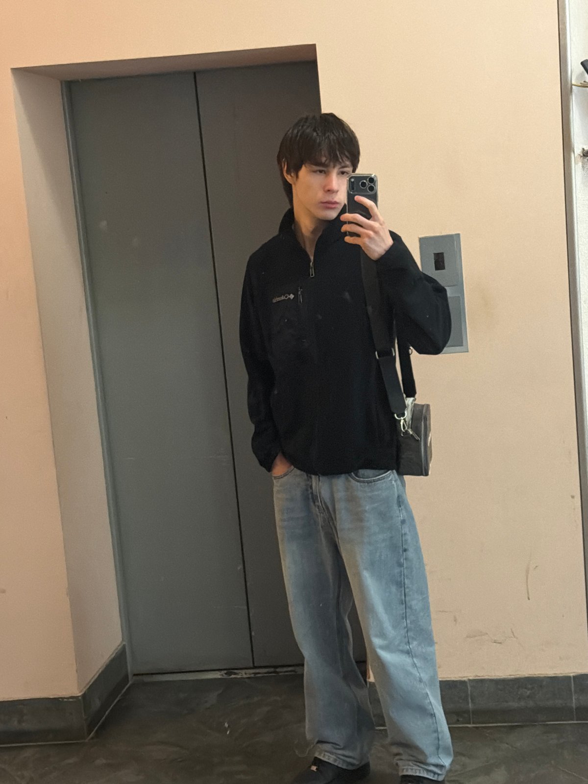 Young man takes elevator selfie in Yekaterinburg
