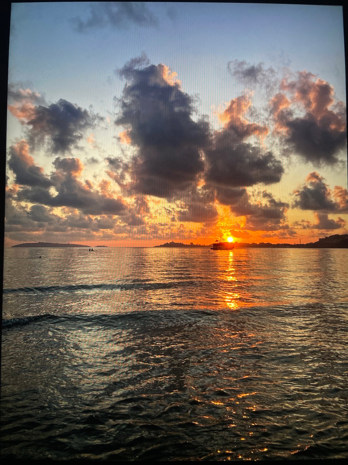 Evening memories captured: sunset coast, candlelit room, cat's eye
