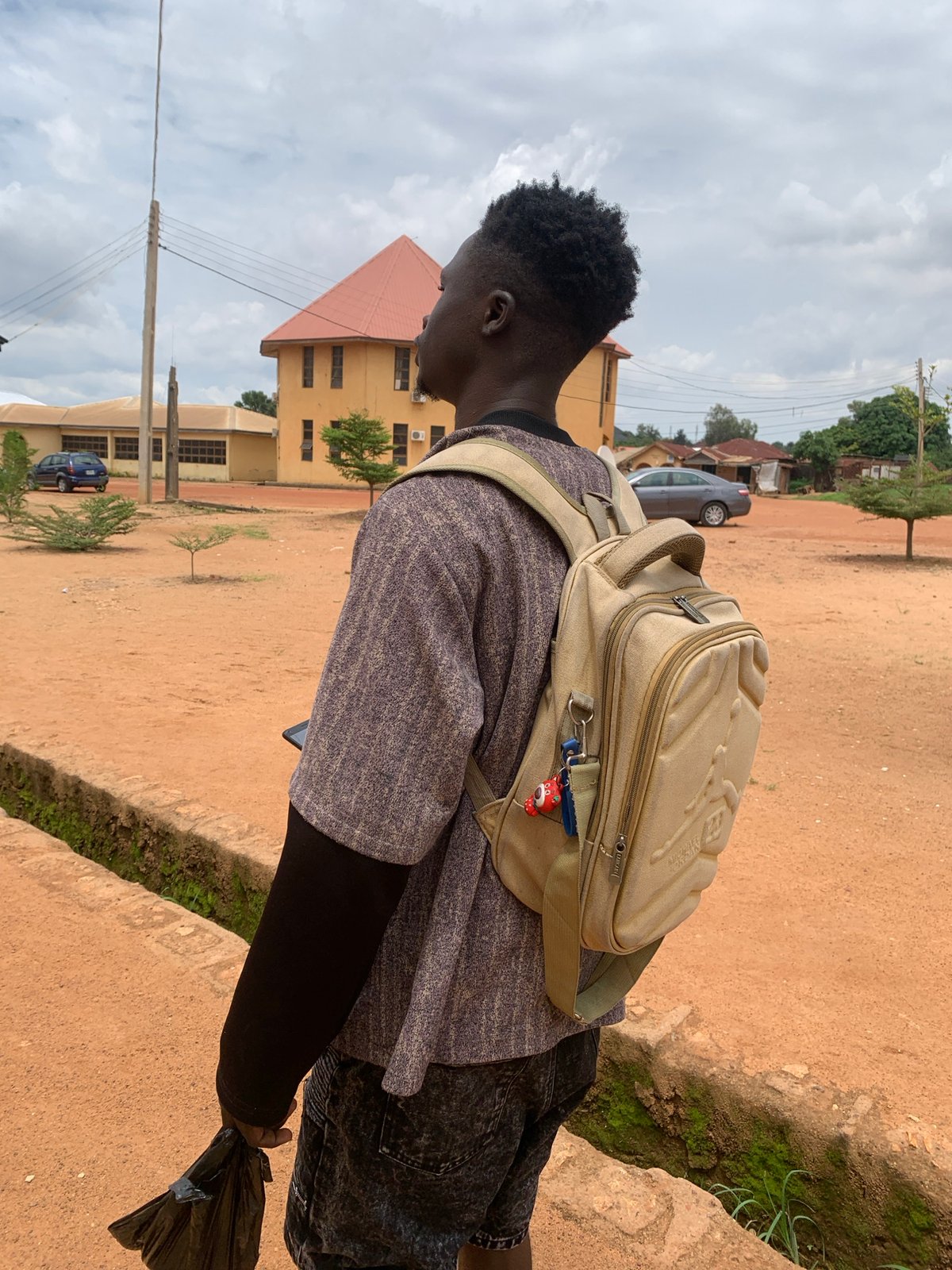 Witness documents everyday scenes across Jos, Nigeria under cloudy skies